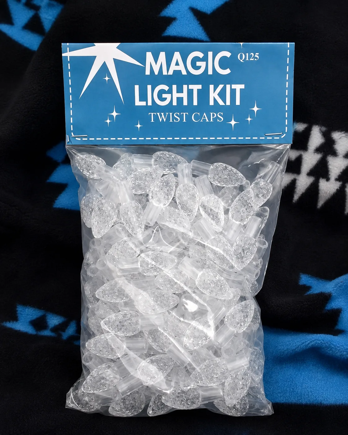 Bag of clear twist caps on a dark blanket